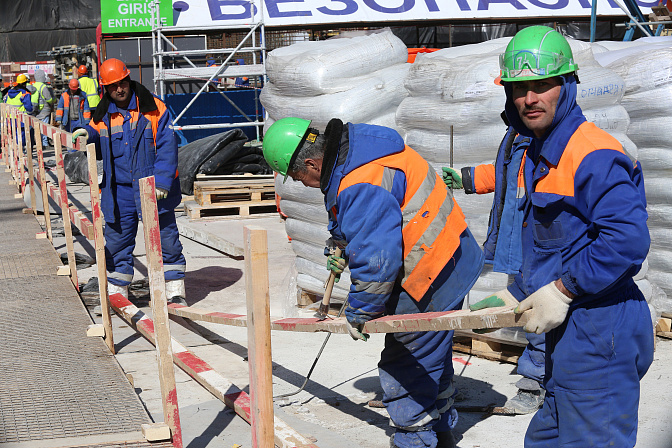 рабочие мигранты строители